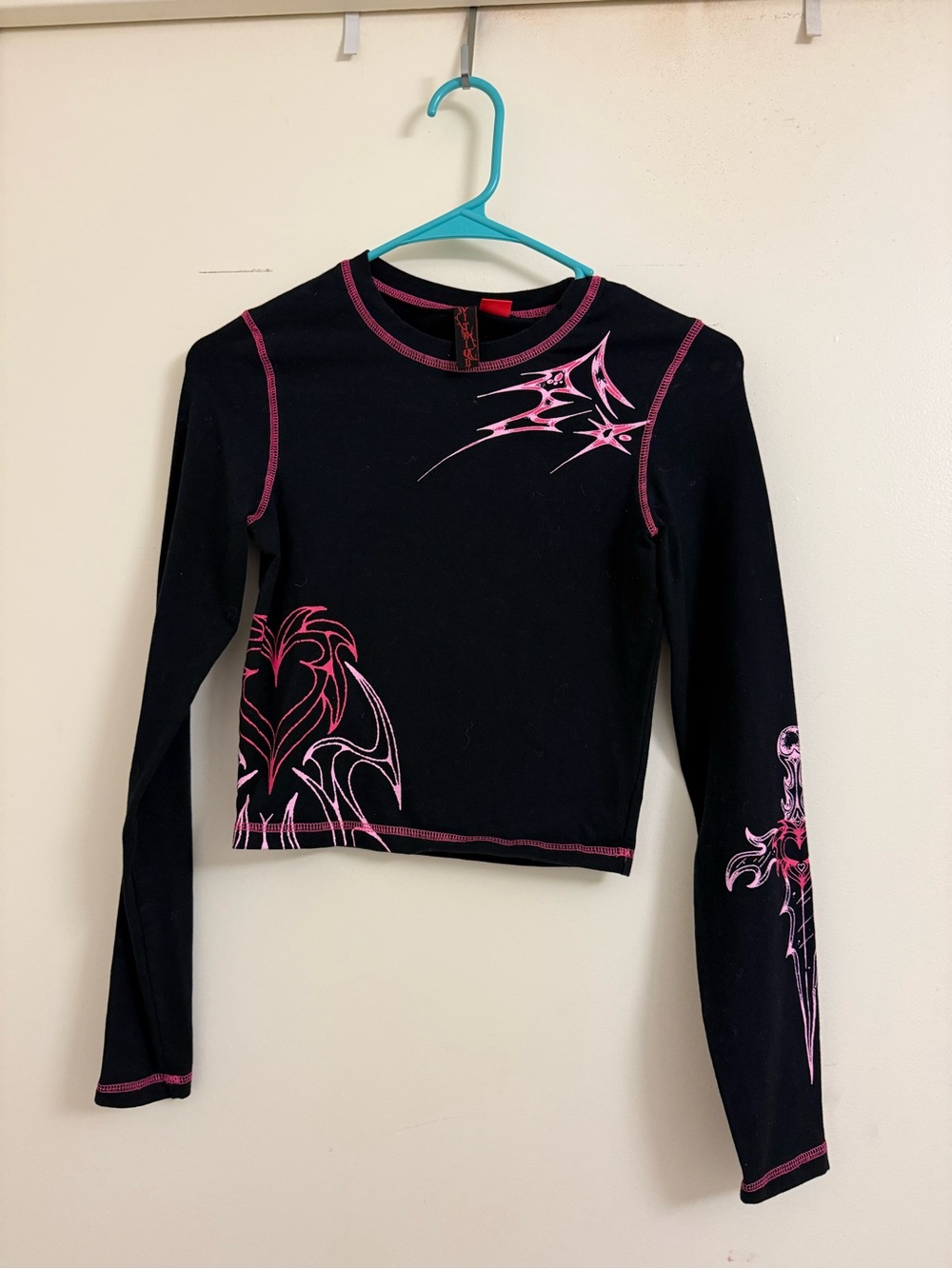 Vitriol Black Long Sleeve Crop Top with Pink Tribal Graphics